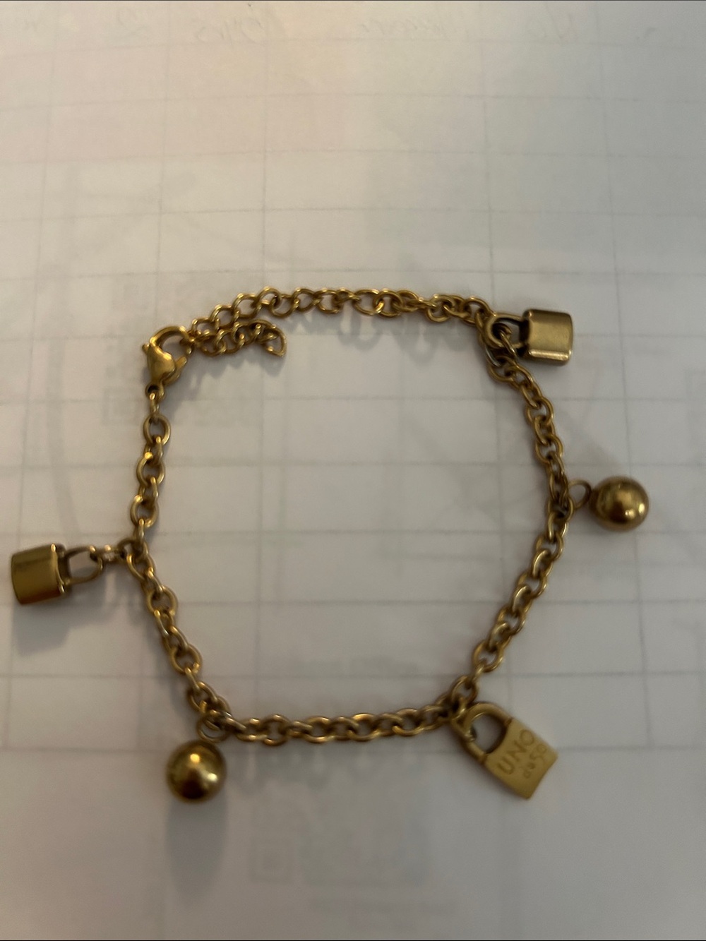 UNO de 50 Gold Tone Padlock & Ball Charm Bracelet